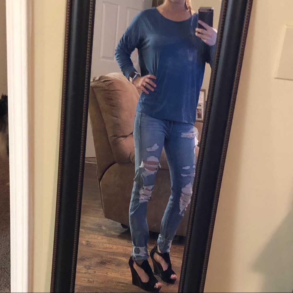 BRAND New fun open back w/ twist blue long sleeves